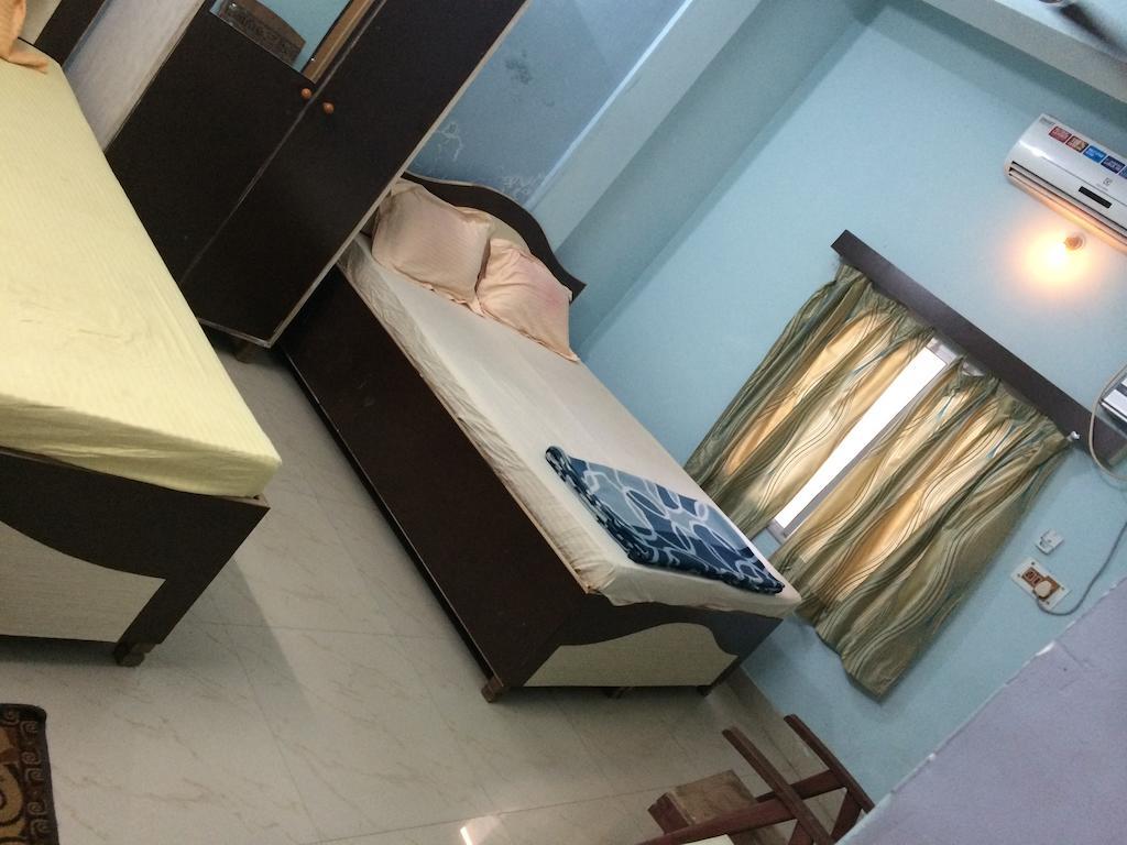 Hotel Pragya International Варанаси Стая снимка